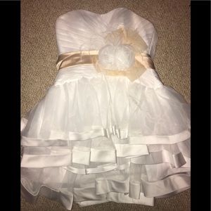 White strapless dress with gold tie